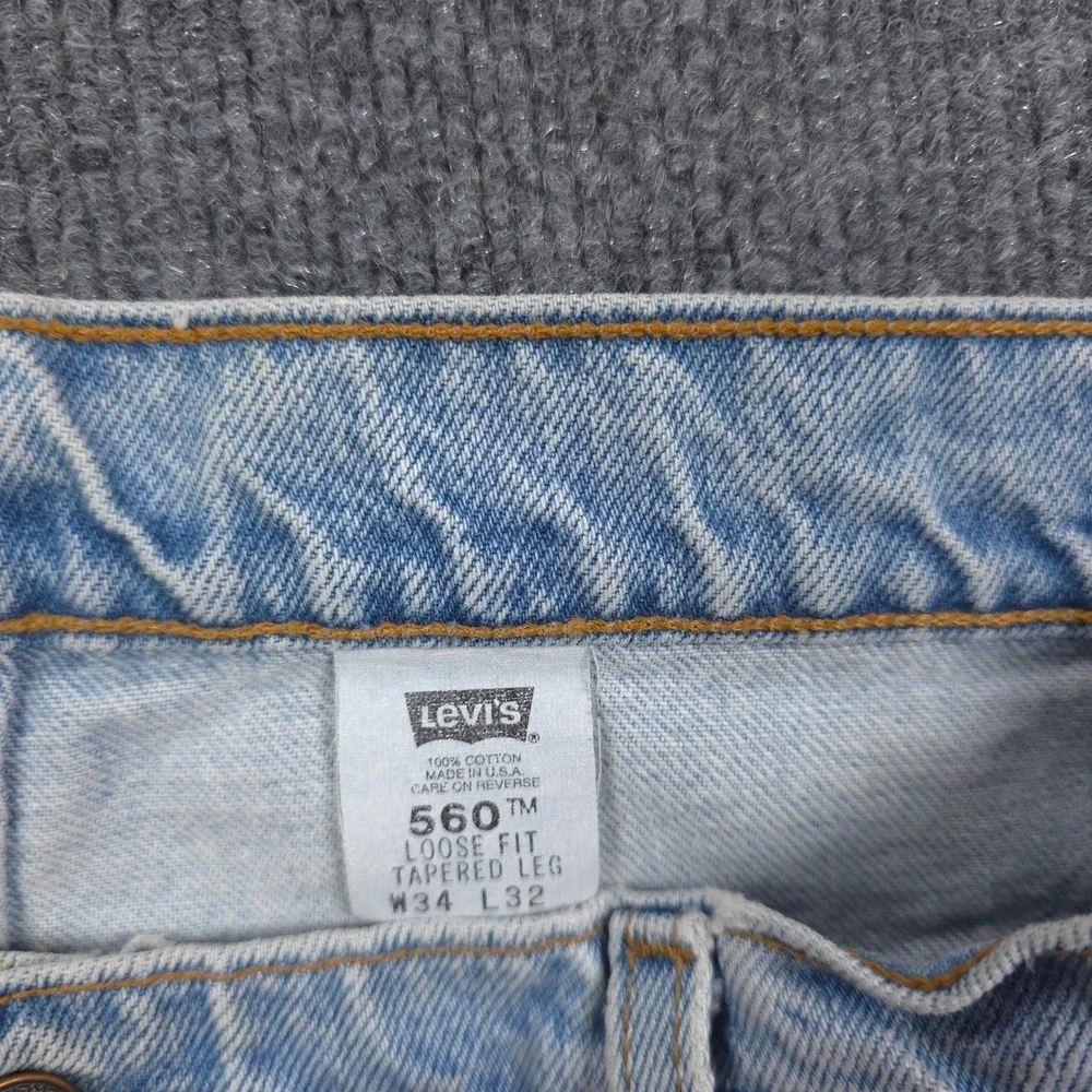 VINTAGE Levis 560 Loose Fit Tapered Leg Jeans Light Wash Blue Mens Denim 34x32